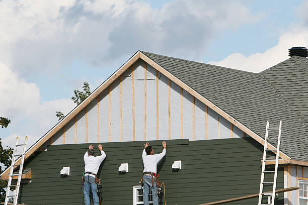 Professional Siding Replacement technician working in Churchville, PA